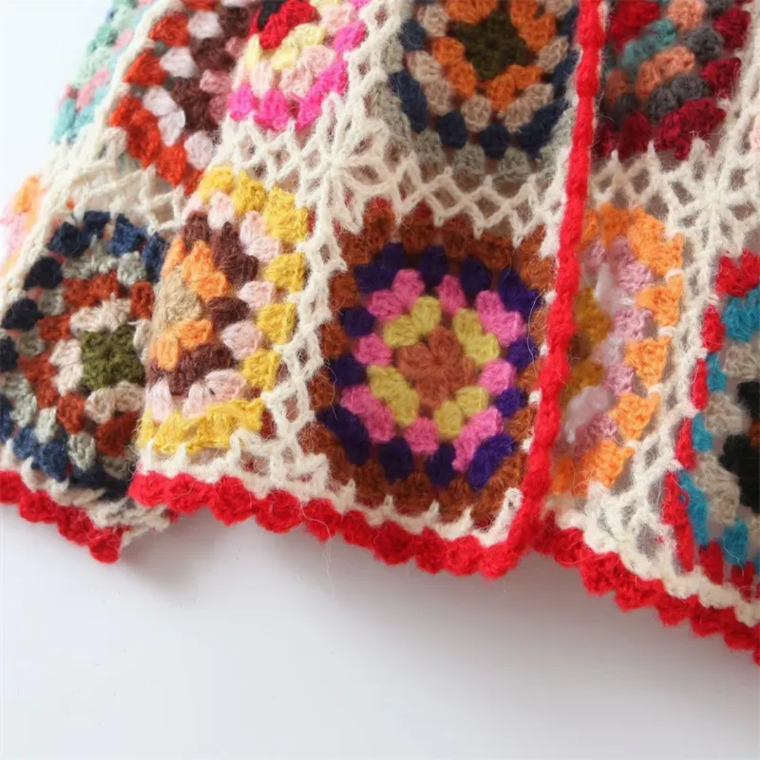 Crochet cardigan with multicoloured motifs