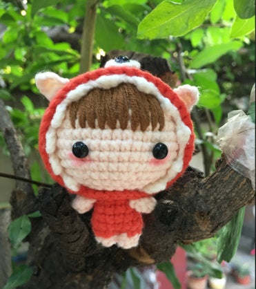 Hand-knitted wool doll