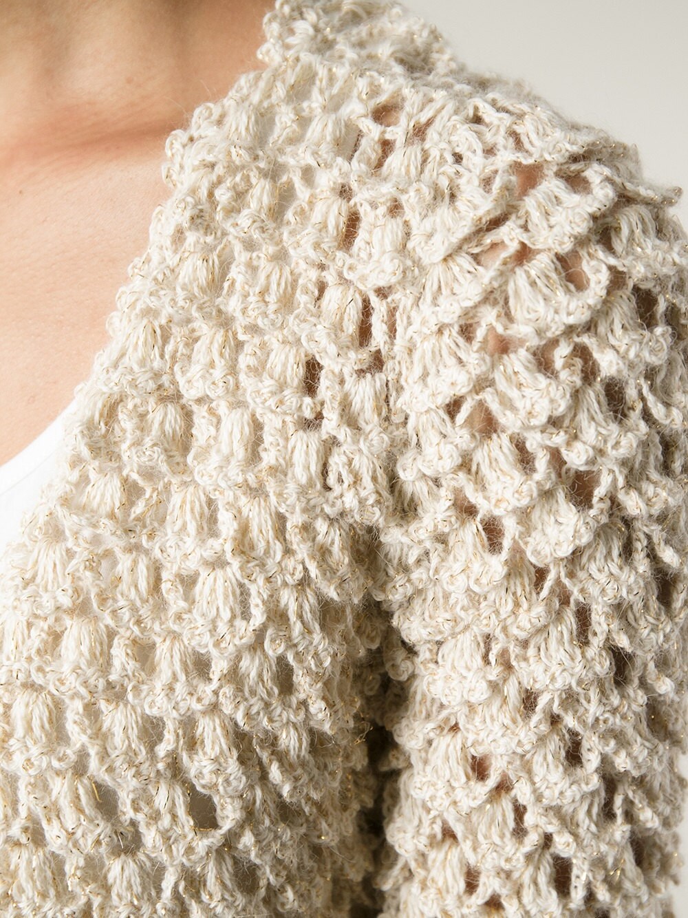 "Clasic Twist" the cardigan that has it all.