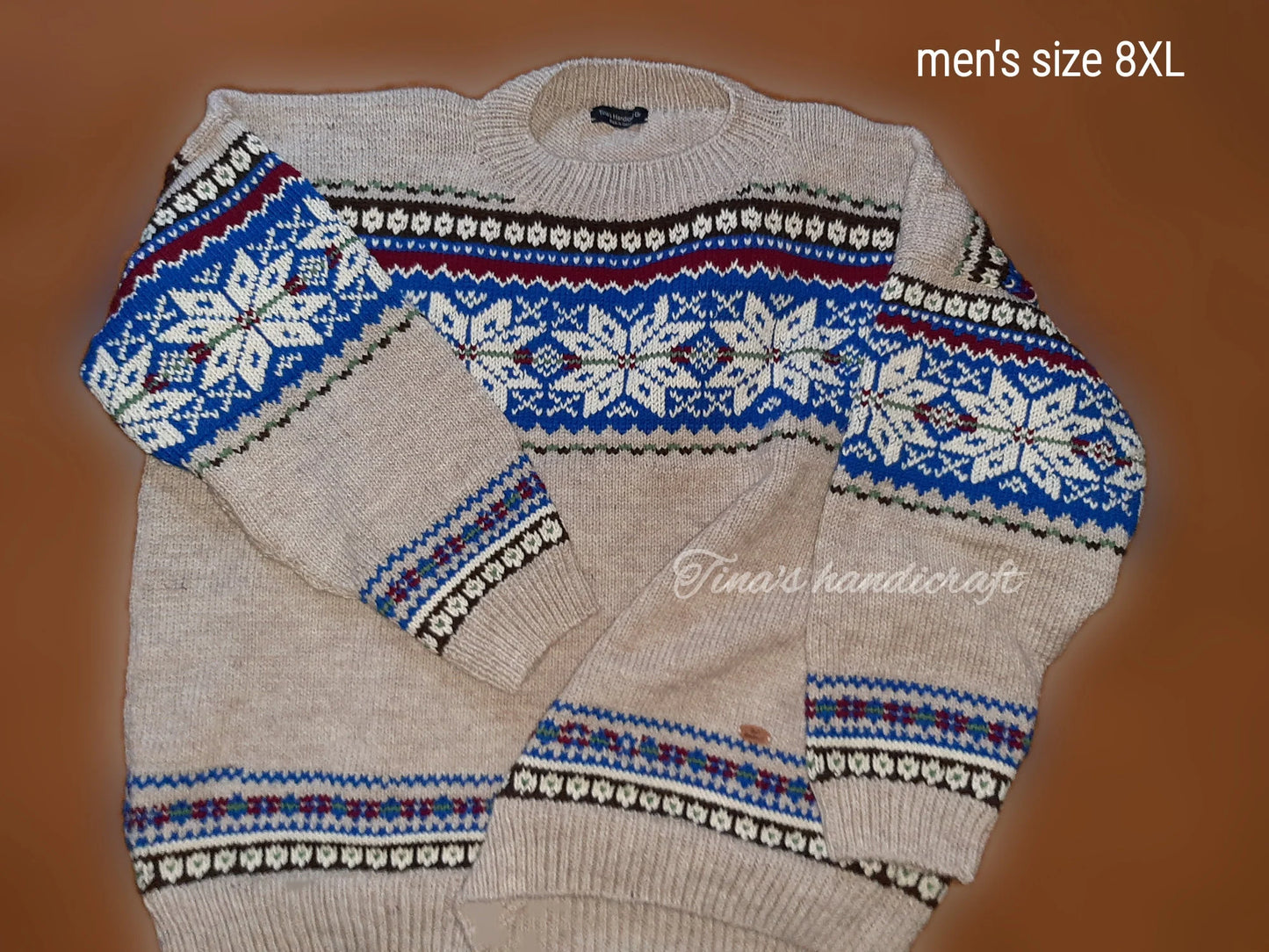Warm and stylish handmade sweater .