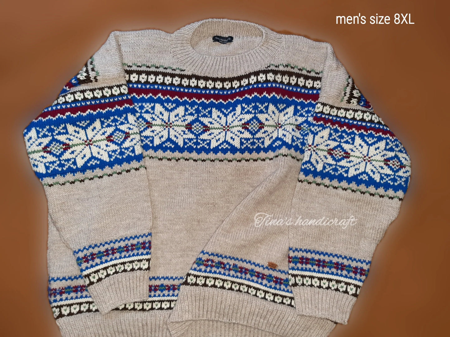 Warm and stylish handmade sweater .