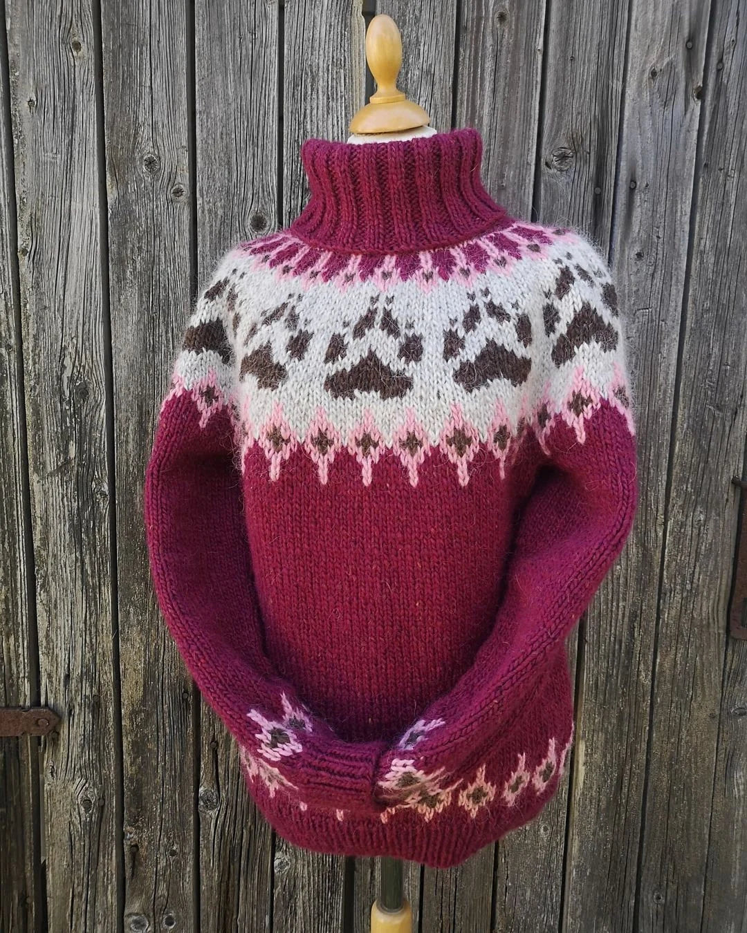 "Animal paw" turtleneck pullover