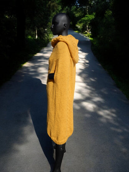 "Unique Handmade Knitted Cape – Warmth with Style"